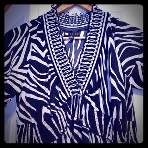 Dress size 10 ( wears like a large)